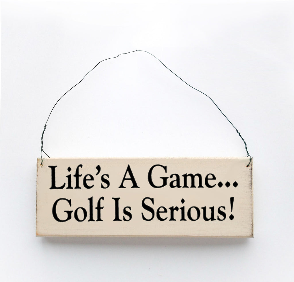 Wood sign saying: Life's a Game, Golf is Serious