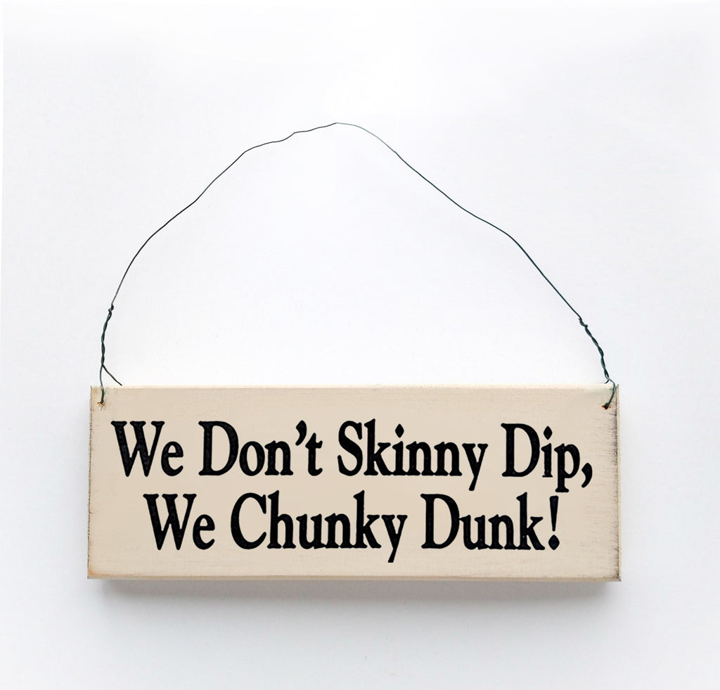 Wood sign saying: We Don't Skinny Dip, We Chunky Dunk