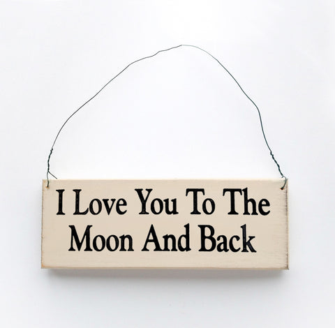 Wood sign saying: I Love You to the Moon and Back